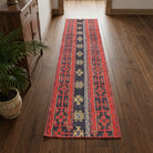Ikat pattern on the Ouranorhoe vintage patchwork runner rug – handmade in Anatolia, Turkey