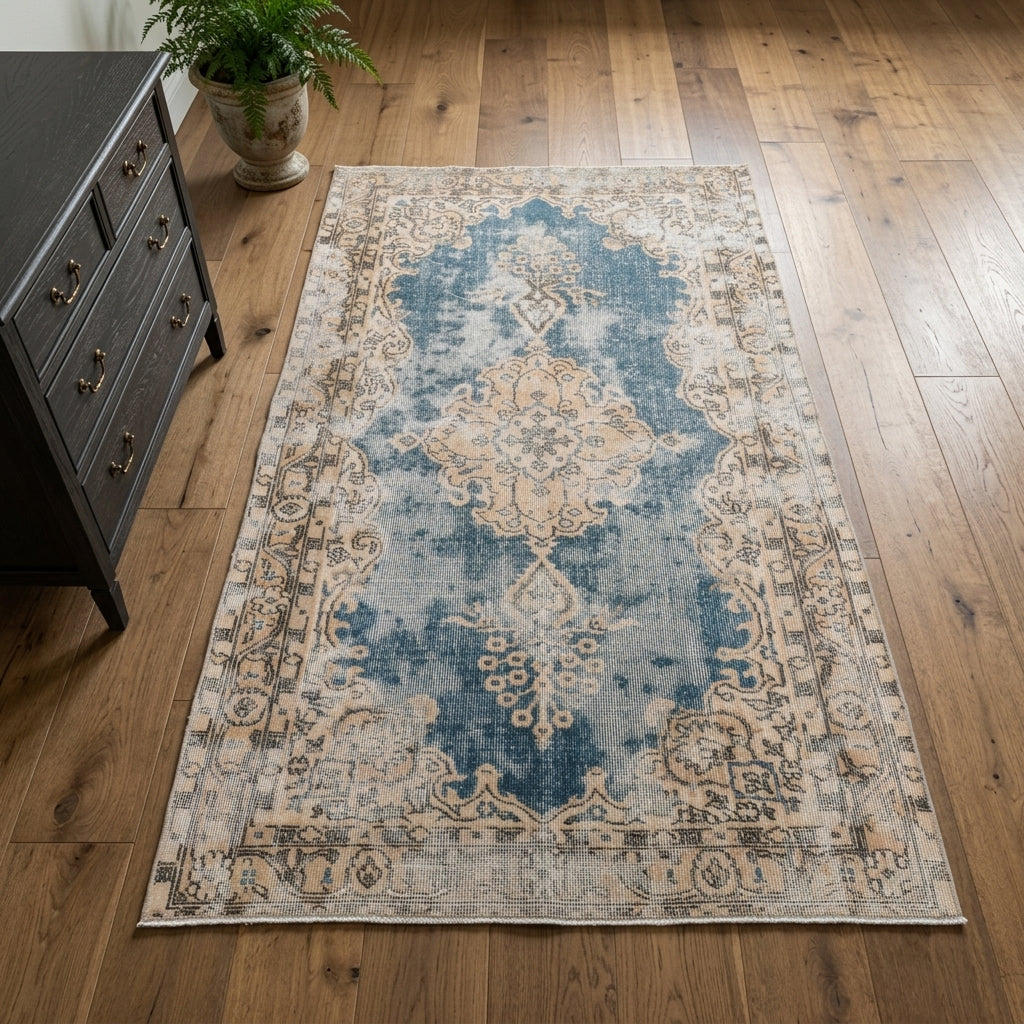 Floral pattern on the Rhea distressed vintage area rug – handmade in Anatolia, Turkey