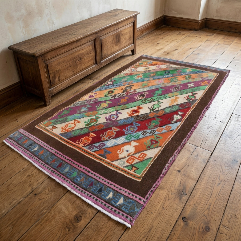 Ikat pattern on the Timophrosyne retro vintage area rug – handmade in Anatolia, Turkey