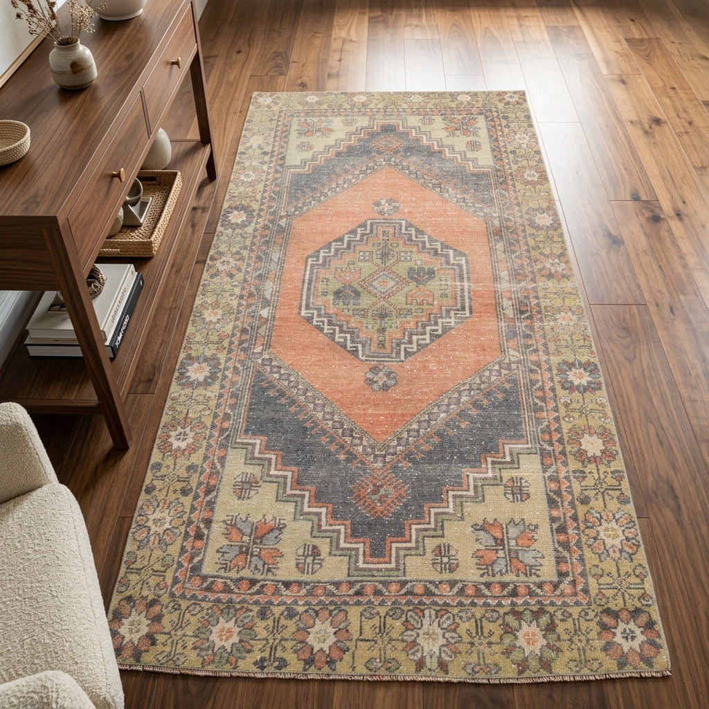 Cybele Turkish vintage accent rug in an entryway with console table – 1970s peach and blue wool rug, 3'5" x 6'4"