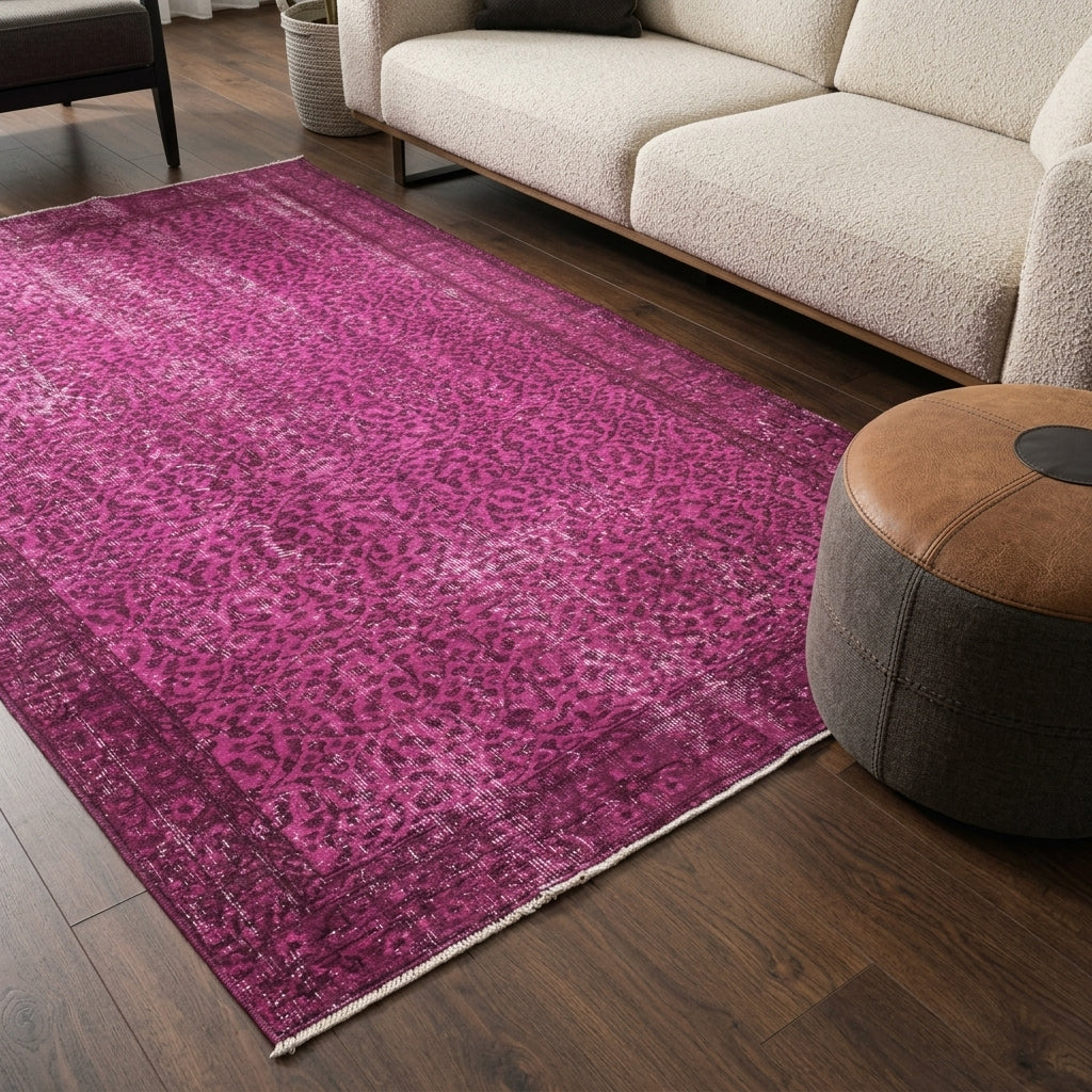 Floral pattern on the Simgecihan overdyed vintage area rug – handmade in Hereke, Turkey