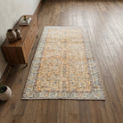 Bordered and floral pattern on the Safirpeyker vintage area rug – handmade in Anatolia, Turkey