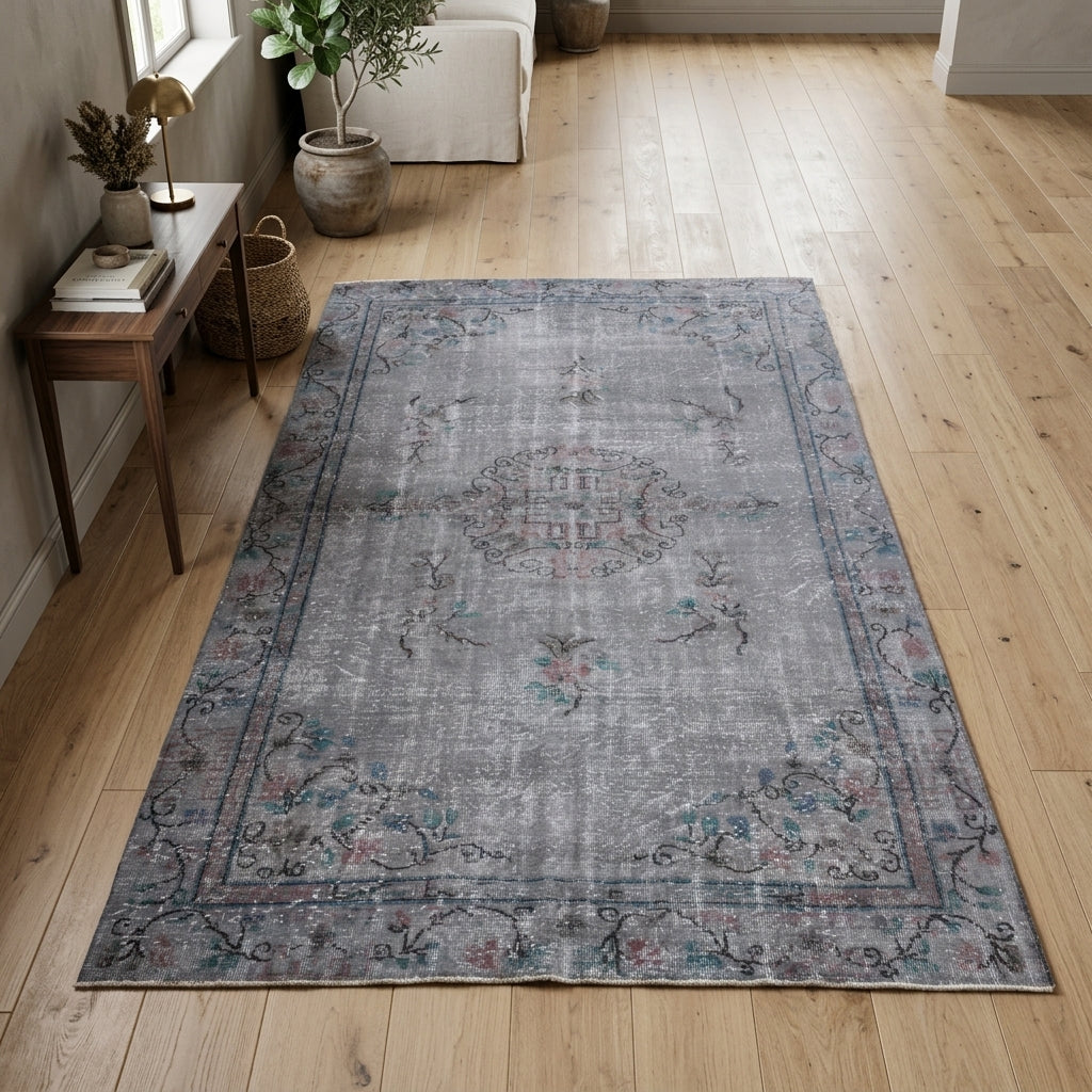 Oriental pattern on the Nihansema overdyed vintage area rug – handmade in Anatolia, Turkey