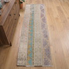 Tribal pattern on the Hosyarsu vintage patchwork runner rug – handmade in Anatolia, Turkey