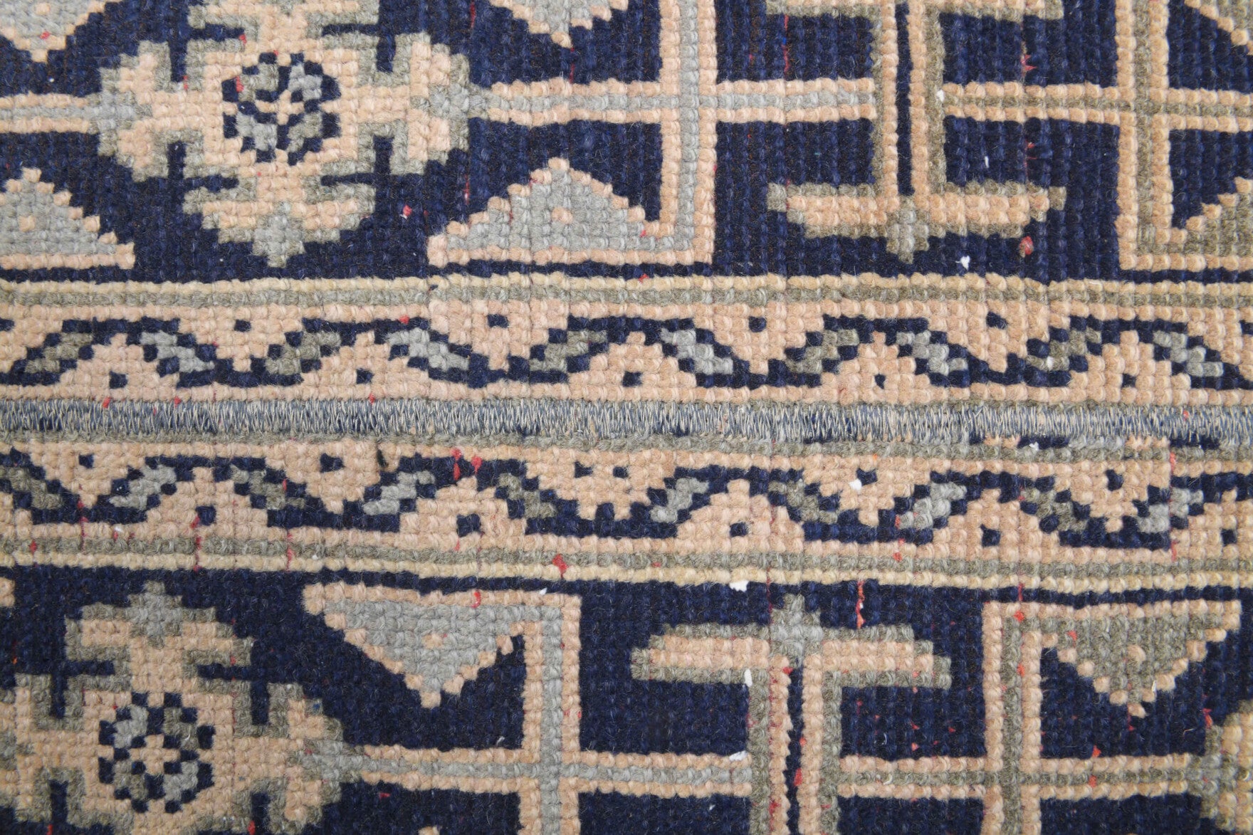 Ambrolampe runner: 1970s handmade Anatolian runner with ikat motifs and fabric backing