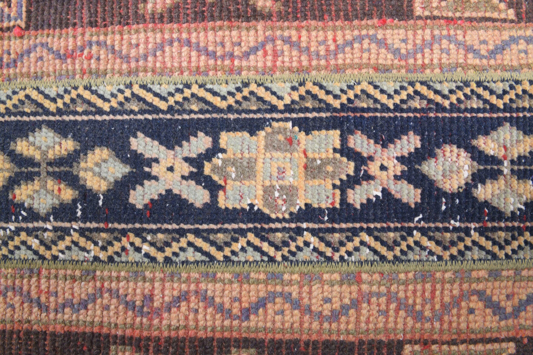 Asterophyllis runner: 1970s handmade Anatolian runner with ikat motifs and fabric backing