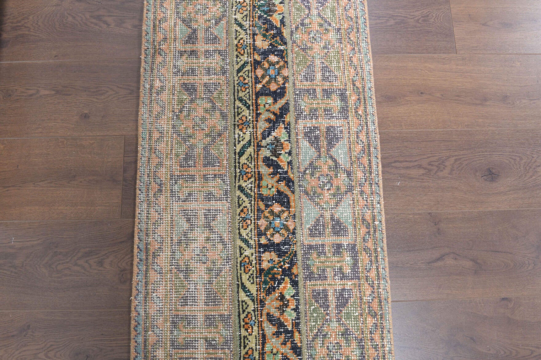 Amaranthchoria runner: 1970s handmade Anatolian runner with ikat motifs and fabric backing