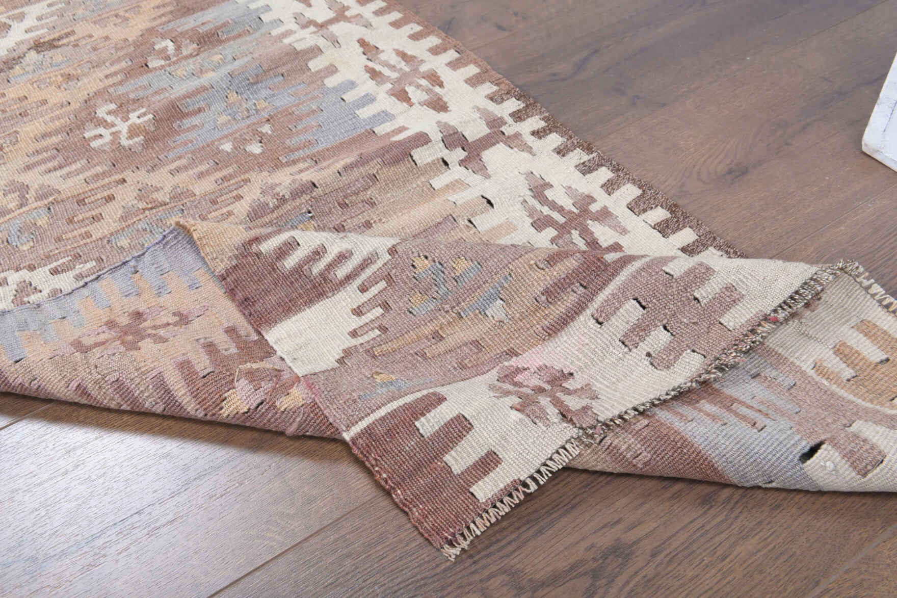 Zephyropelia runner: 1970s handwoven flatweave Anatolian runner with ikat motifs and cotton backing