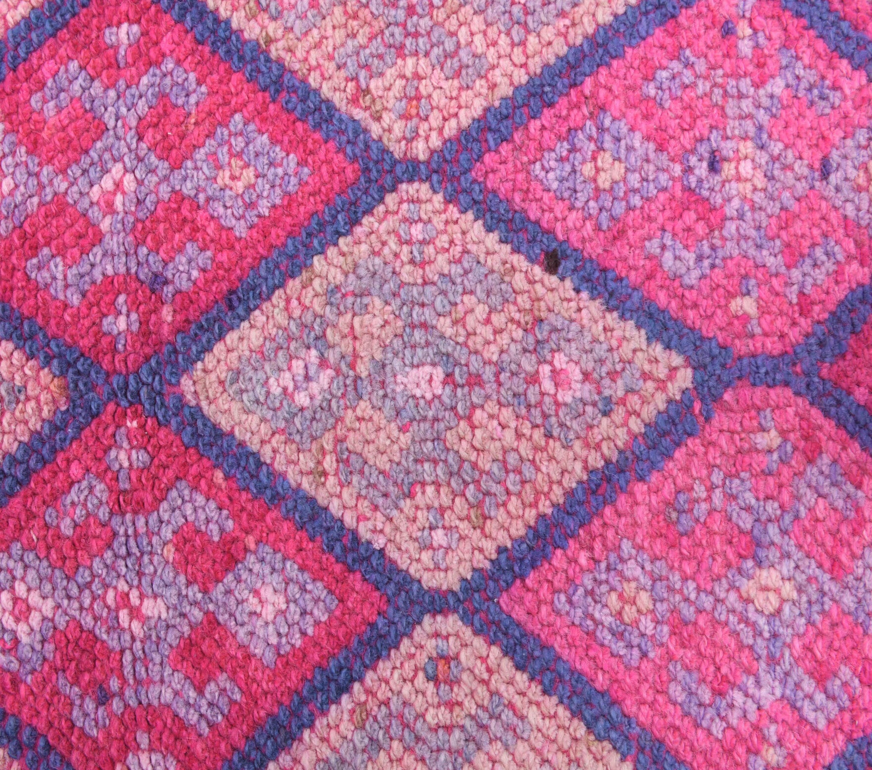 Semadeniz runner: 1970s handmade Anatolian runner with ikat motifs and cotton backing