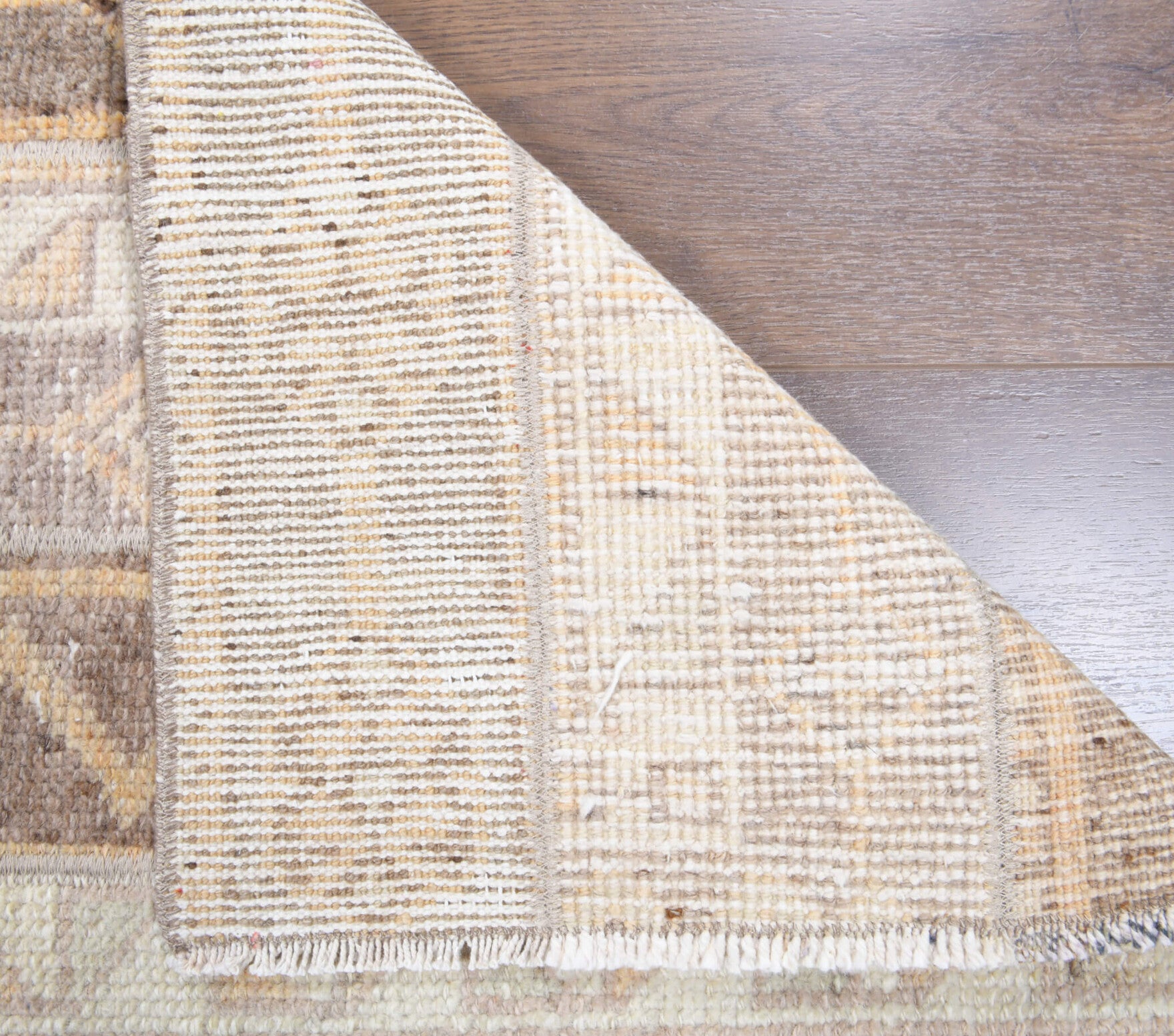 Atlaskusa runner: 1970s handmade Anatolian runner with ikat motifs and fabric backing