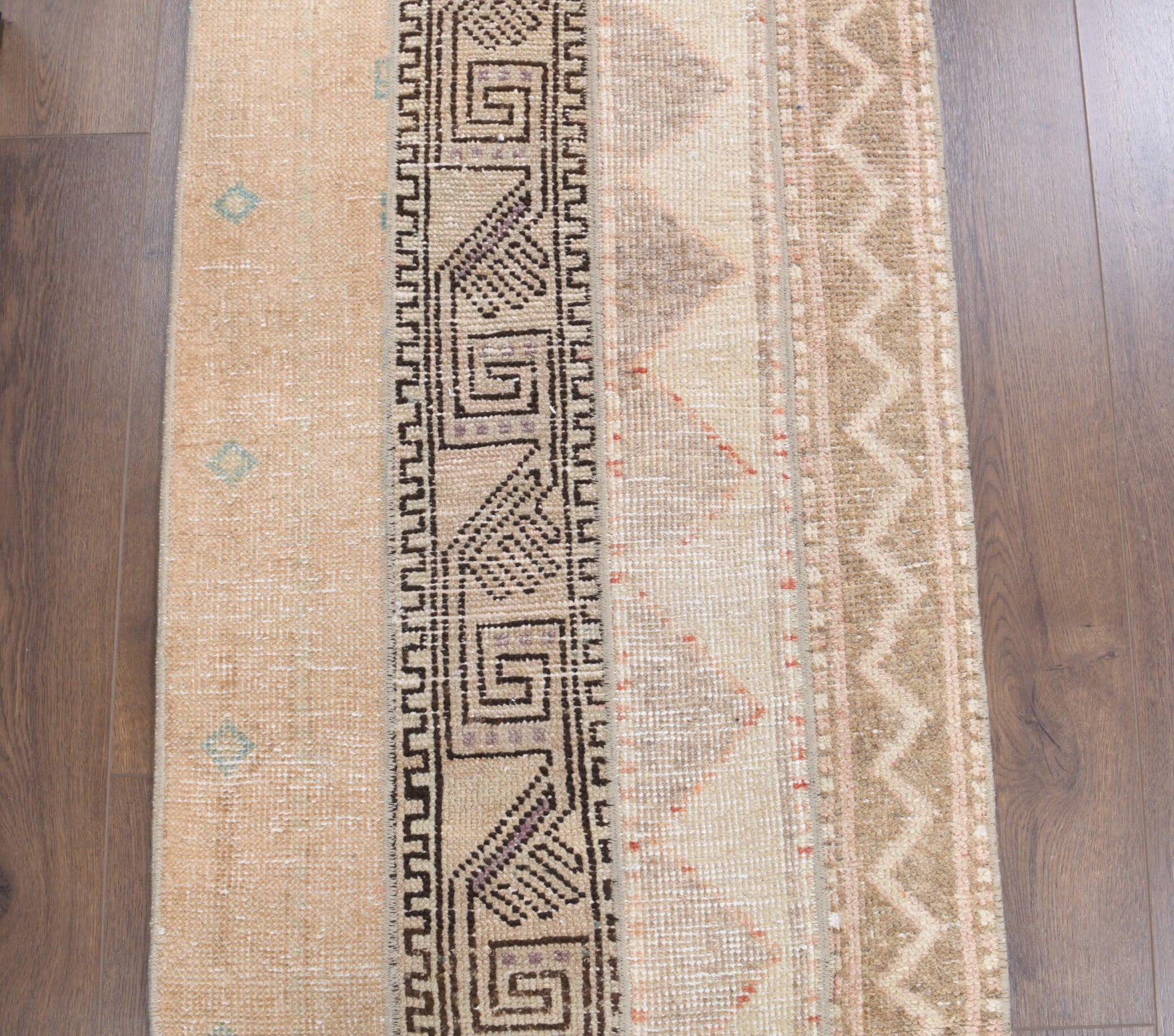 Aristodora runner: 1970s handmade Anatolian runner with ikat motifs and fabric backing