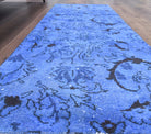 Gumuspare runner: 1970s handmade Anatolian runner with floral motifs and cotton backing