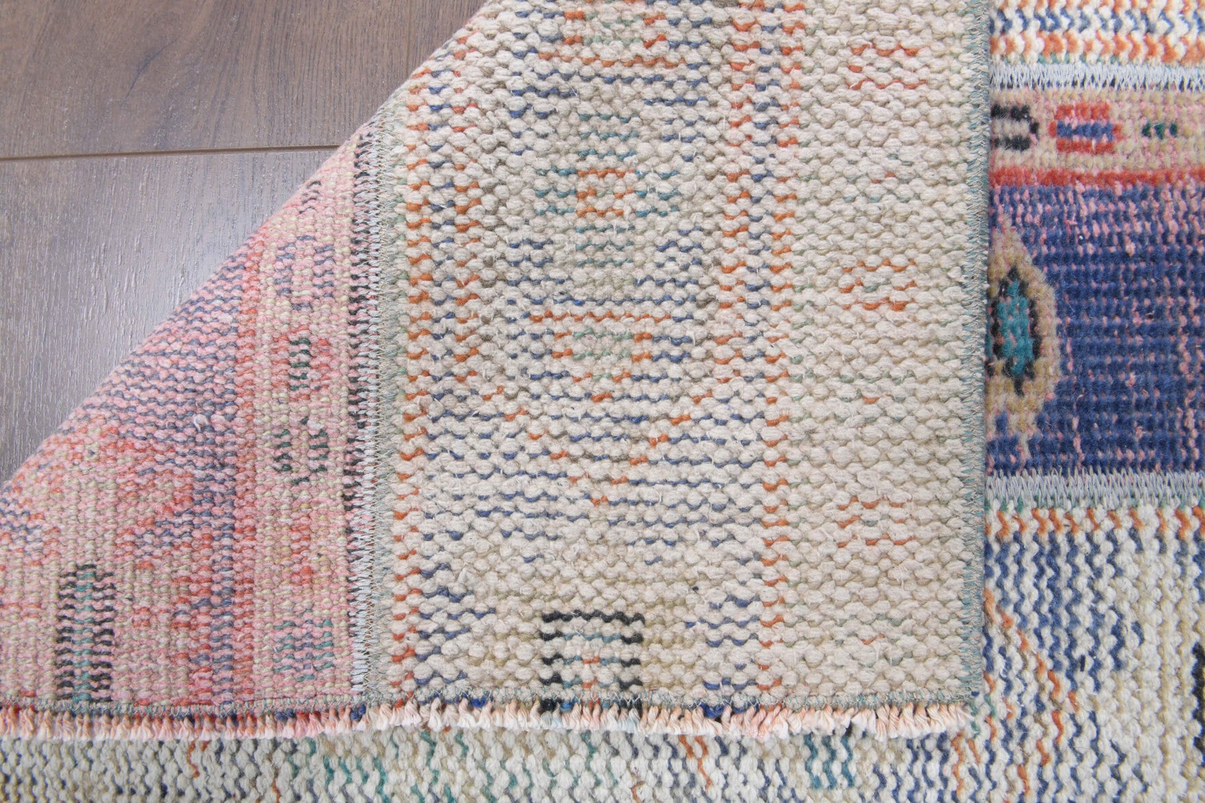 Astrakrateia runner: 1970s handmade Anatolian runner with ikat motifs and fabric backing
