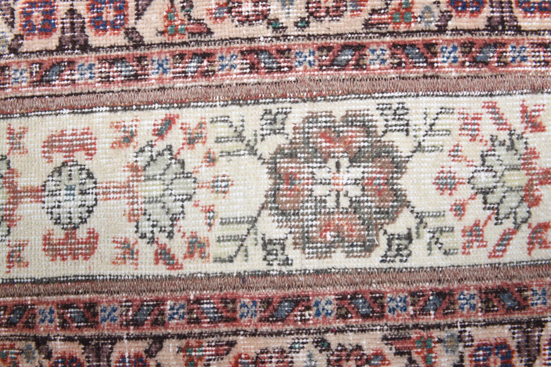 Andros runner: 1970s handmade Anatolian runner with oriental motifs and fabric backing