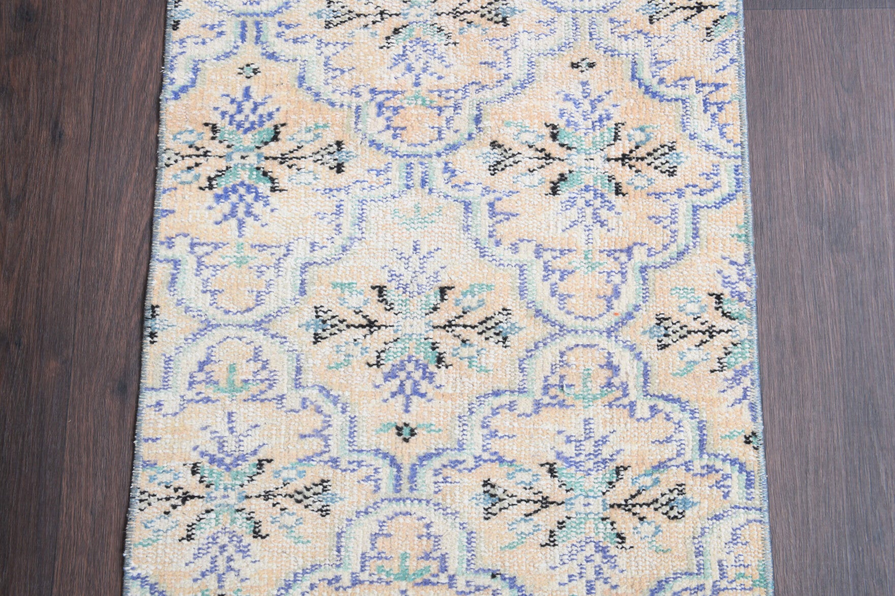 Fundahayat runner: 1970s handmade Anatolian runner with floral motifs and cotton backing