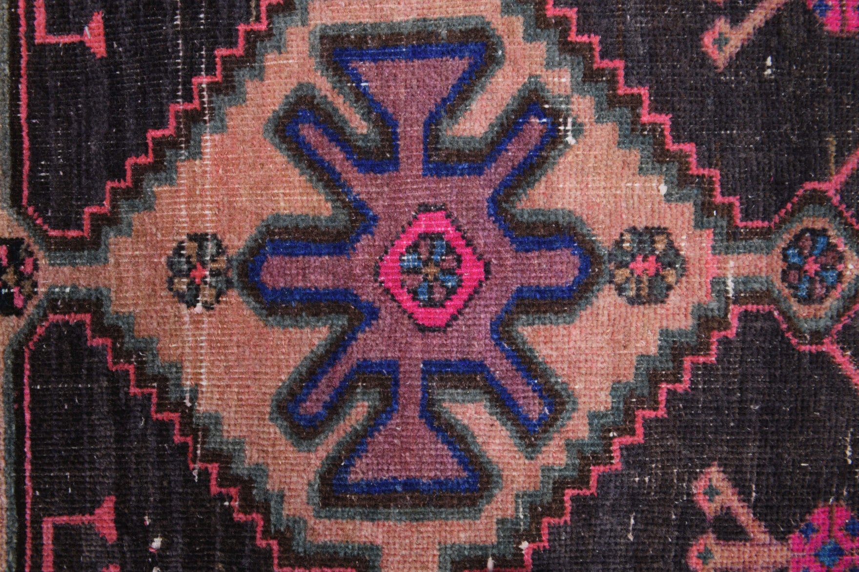 Halophora runner: 1970s handmade Anatolian runner with oriental motifs and cotton backing
