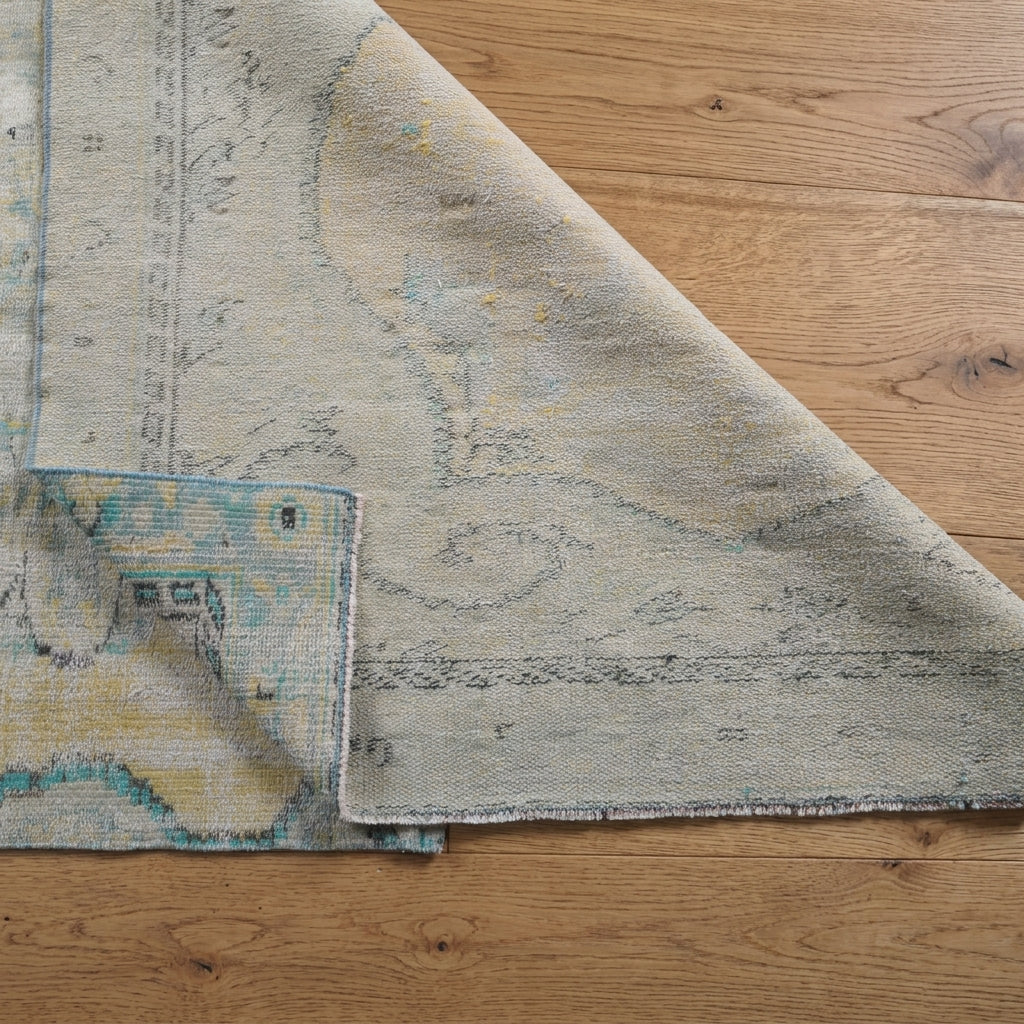 Oriental pattern on the Hedypheme antique washed vintage area rug – handmade in Anatolia, Turkey