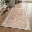 Floral bordered pattern on the Filizsu vintage area rug – handmade in Anatolia, Turkey
