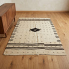 Ikat pattern on the Yesimgonca vintage kilim rug – handwoven flatweave in Anatolia, Turkey