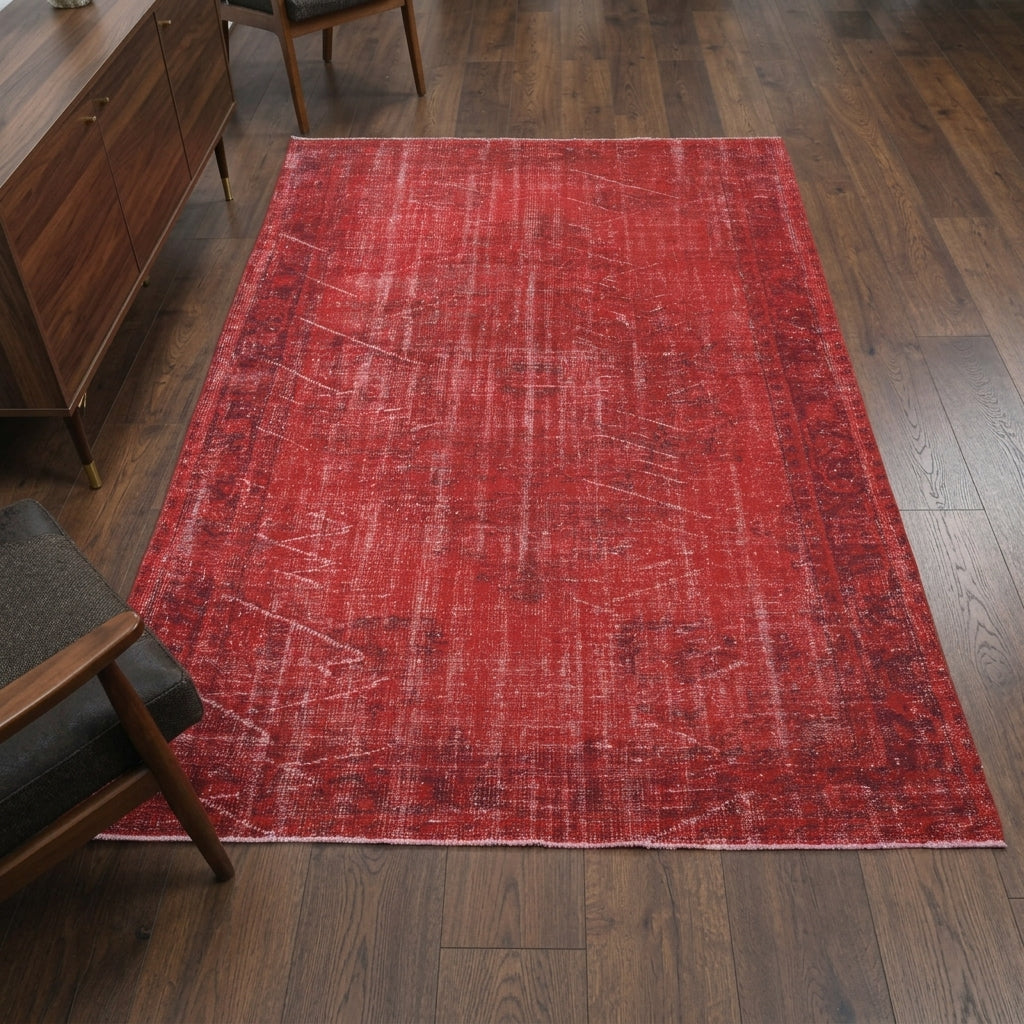 Oriental pattern on the Nigarmelek overdyed vintage area rug – handmade in Anatolia, Turkey