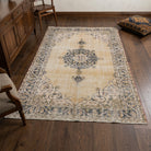 Oriental and medallion pattern on the Timopelia vintage area rug – handmade in Anatolia, Turkey