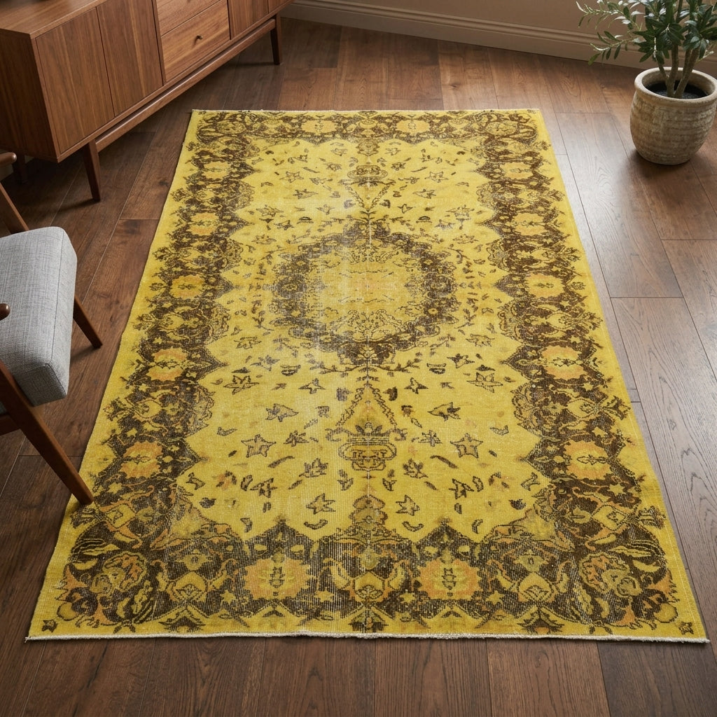 Oriental pattern on the Phainonike overdyed vintage area rug – handmade in Anatolia, Turkey