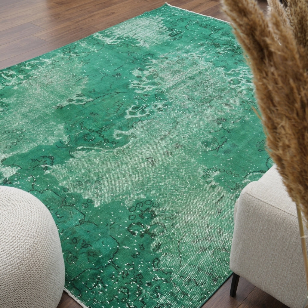 Floral pattern on the Gumusperi overdyed vintage area rug – handmade in Anatolia, Turkey
