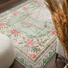Floral pattern on the Peitho vintage area rug – handmade in Anatolia, Turkey