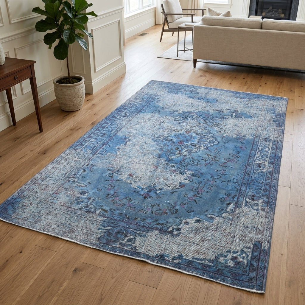 Oriental pattern on the Sedanurumut 1970's distressed vintage area rug – handmade in Anatolia, Turkey