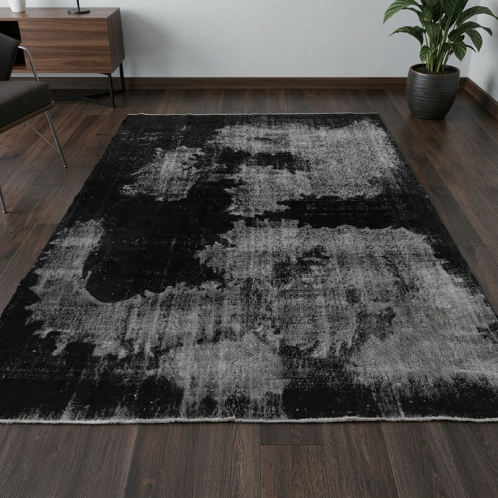 Solid pattern on the Argyrolyra overdyed vintage area rug – handmade in Anatolia, Turkey