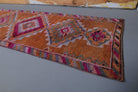 Ouranodike runner: 1970s handmade Anatolian runner with ikat motifs and cotton backing