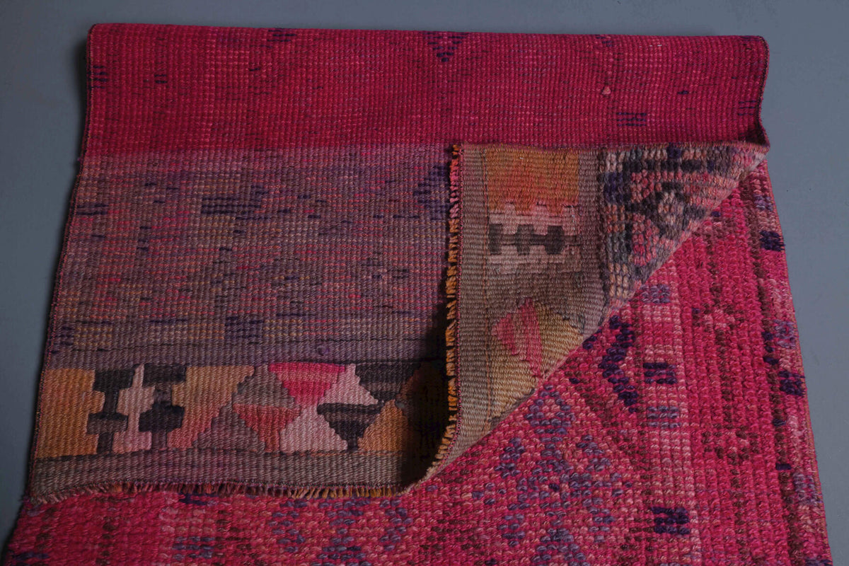 Nigarbahar runner: 1970s handmade Anatolian runner with ikat motifs and cotton backing