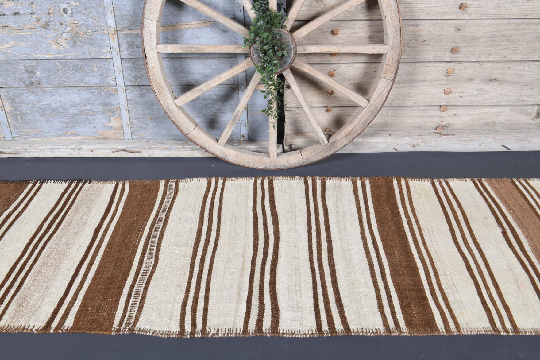 Siderophyllis runner: 1970s handwoven flatweave Anatolian runner with striped motifs and cotton backing