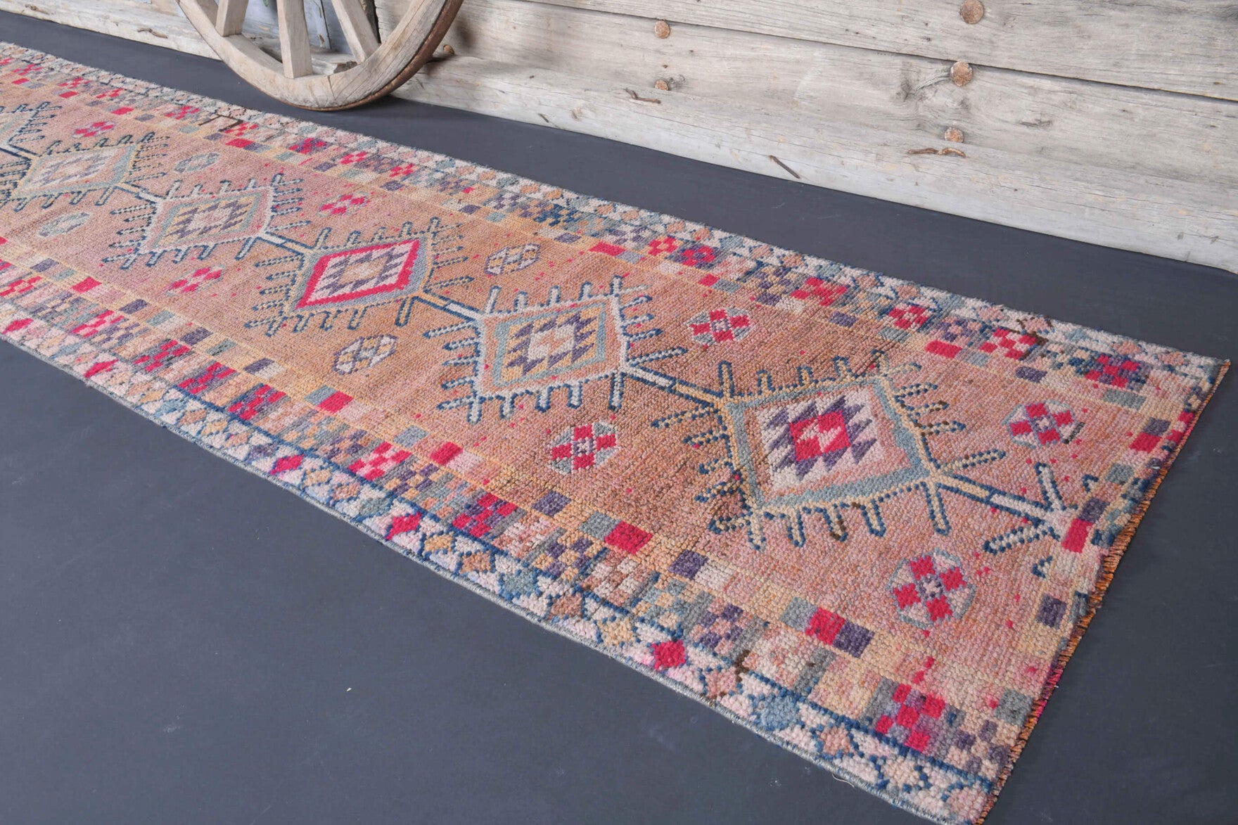 Sevdapare runner: 1970s handmade Anatolian runner with oriental motifs and cotton backing