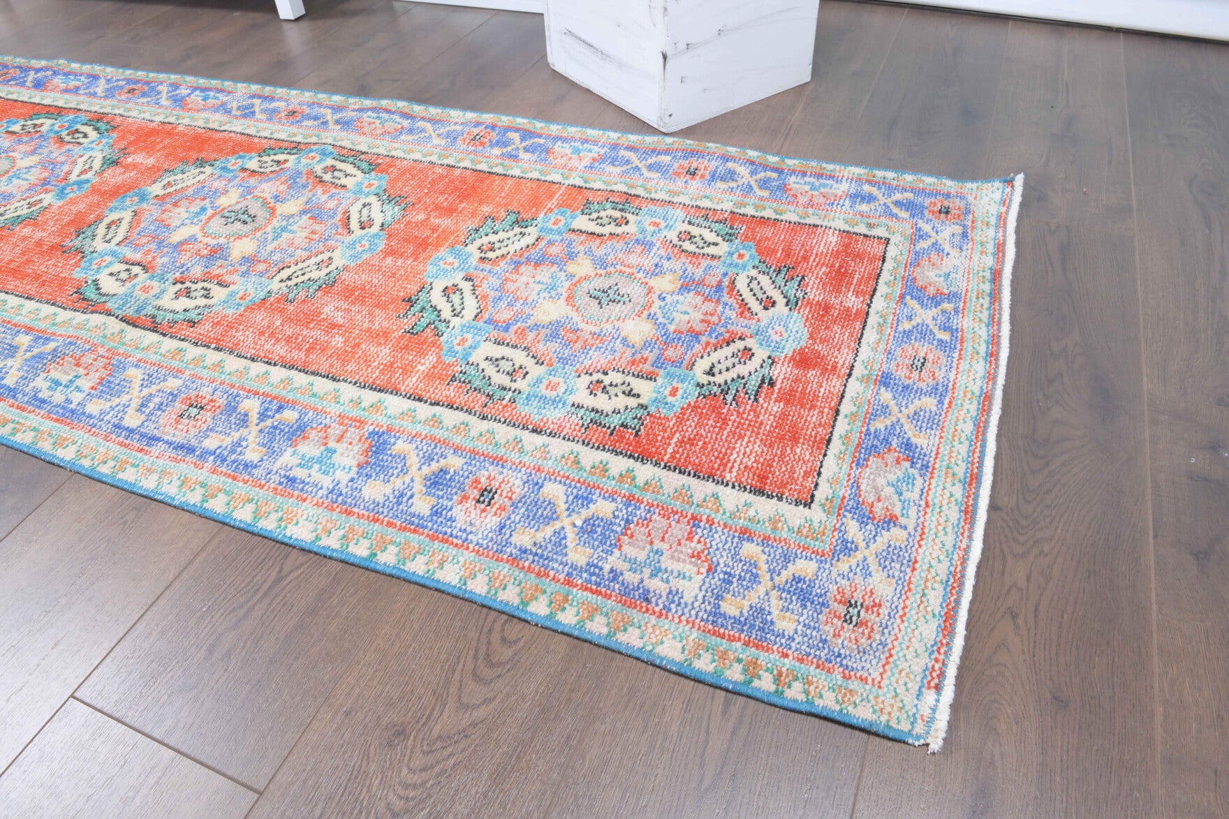 Zumrutnisin runner: 1970s handmade Anatolian runner with oriental motifs and cotton backing