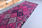 Galatea runner: 1970s handmade Anatolian runner with ikat motifs and cotton backing