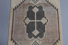 Nahitgul runner: 1970s handmade Anatolian runner with tribal motifs and cotton backing