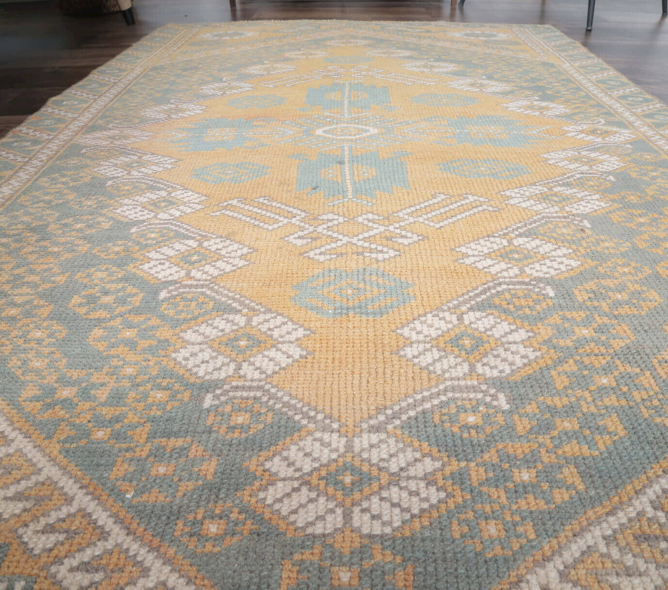 Irinia rug: 1970s handmade Anatolian rug with oriental motifs and cotton backing