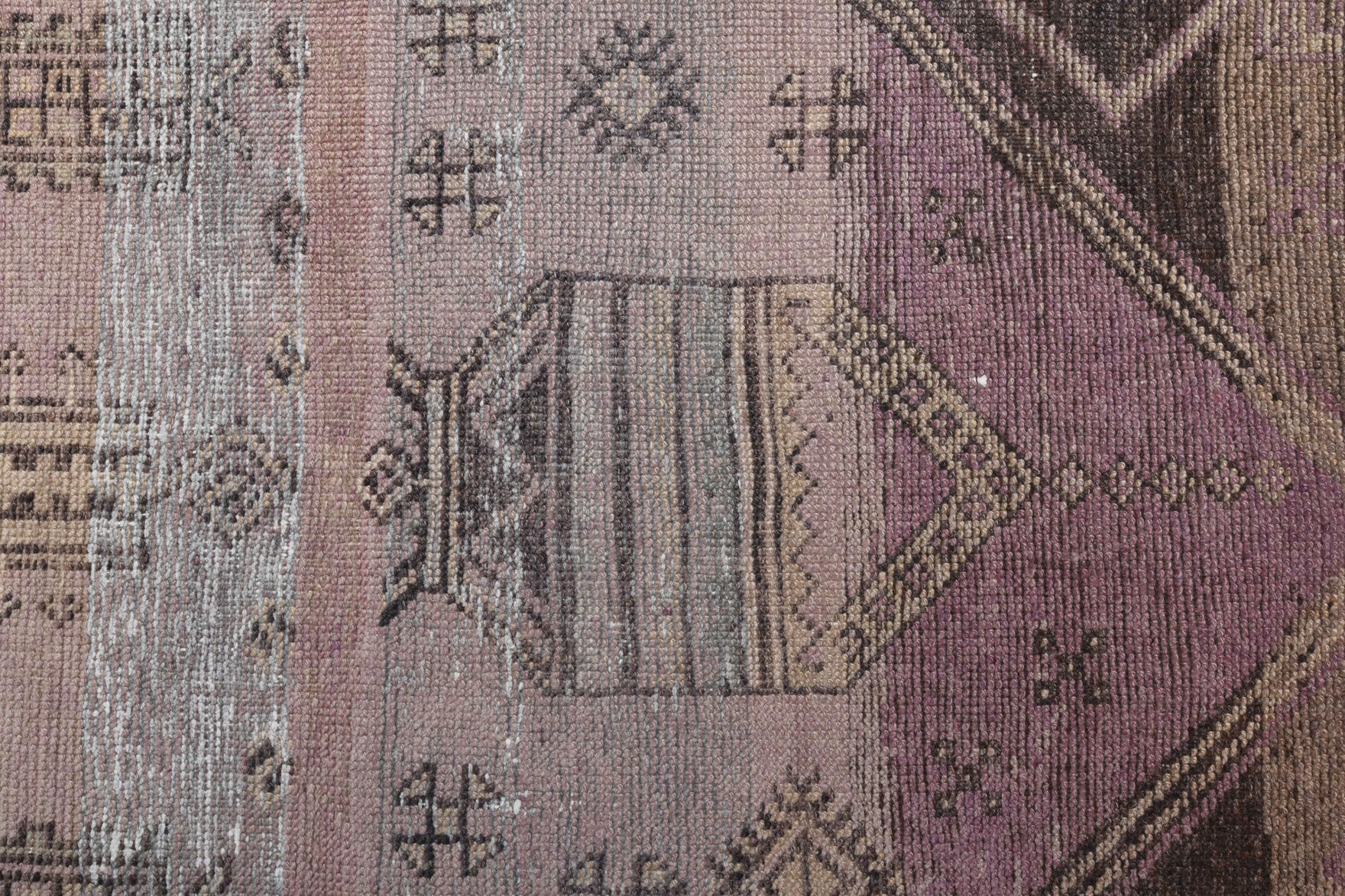 Yesimnihal runner: 1970s handmade Anatolian runner with oriental motifs and cotton backing