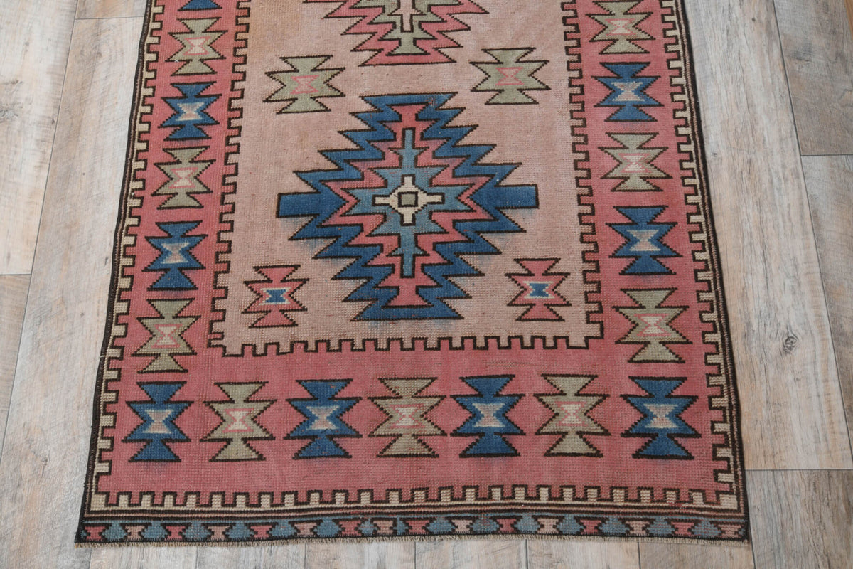 Safiyenaz rug: 1970s handmade Anatolian rug with oriental motifs and cotton backing