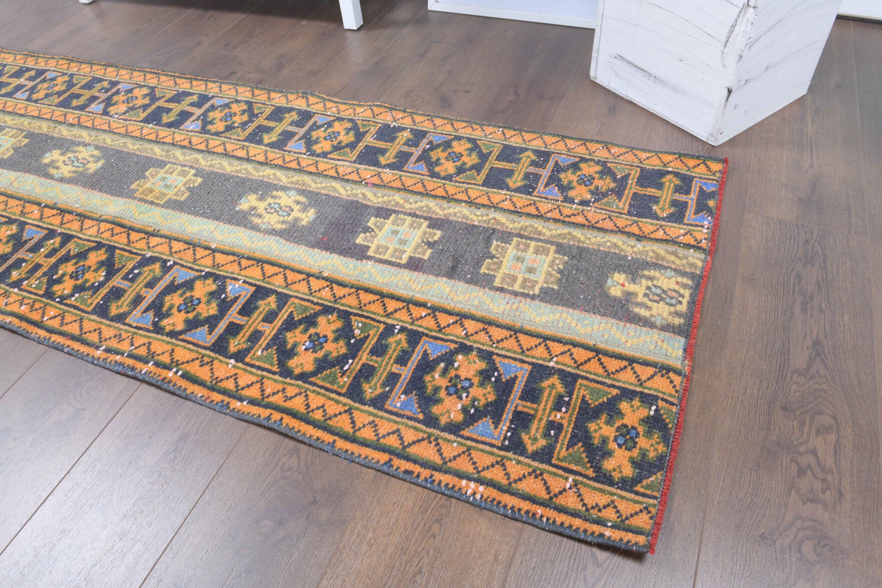Aspendos runner: 1970s handmade Anatolian runner with oriental motifs and fabric backing