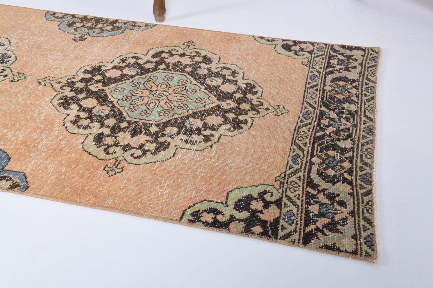 Esenlale runner: 1970s handmade Anatolian runner with oriental motifs and cotton backing
