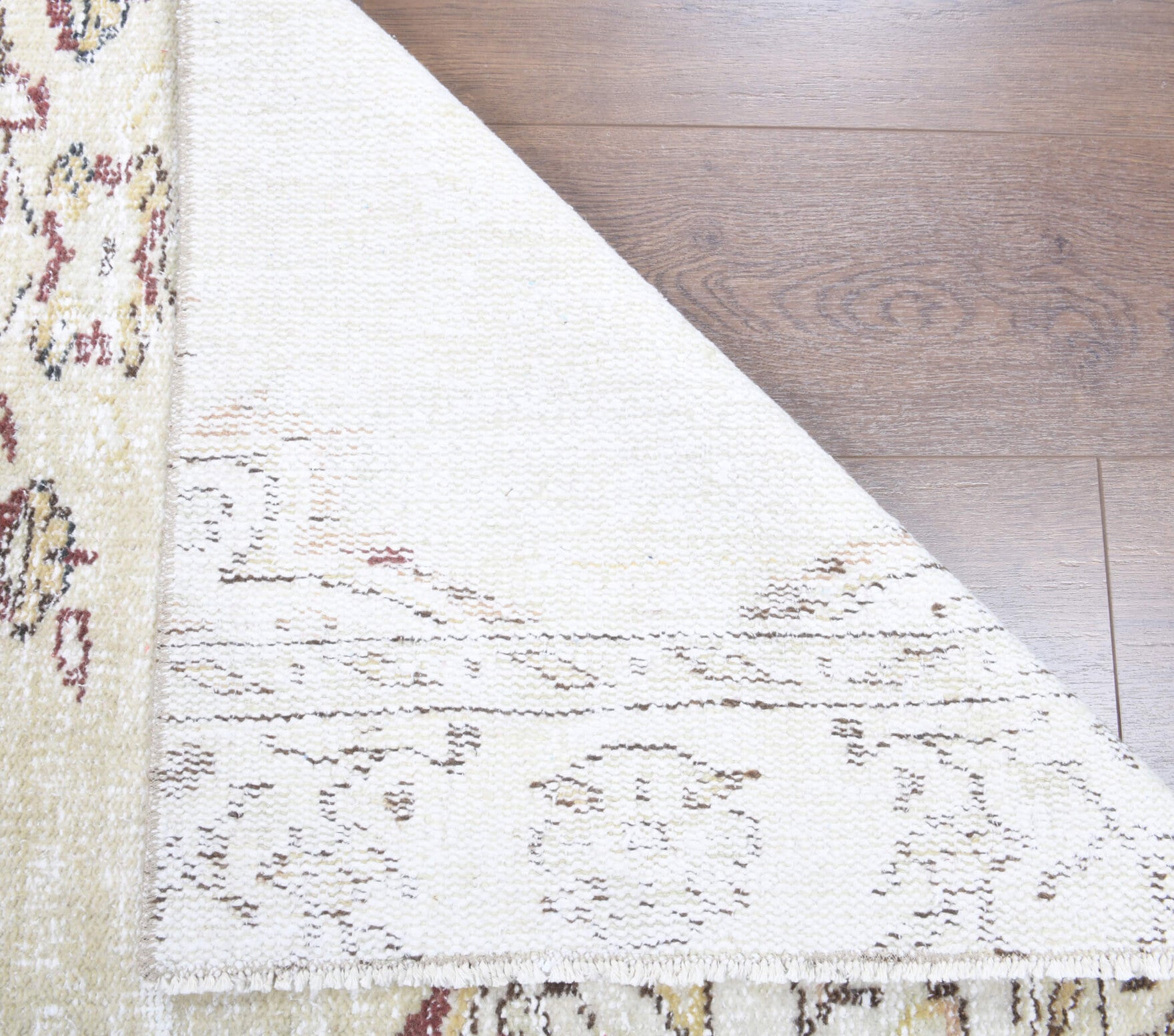 Akikara runner: 1970s handmade Anatolian runner with oriental motifs and cotton backing