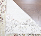 Akikara runner: 1970s handmade Anatolian runner with oriental motifs and cotton backing