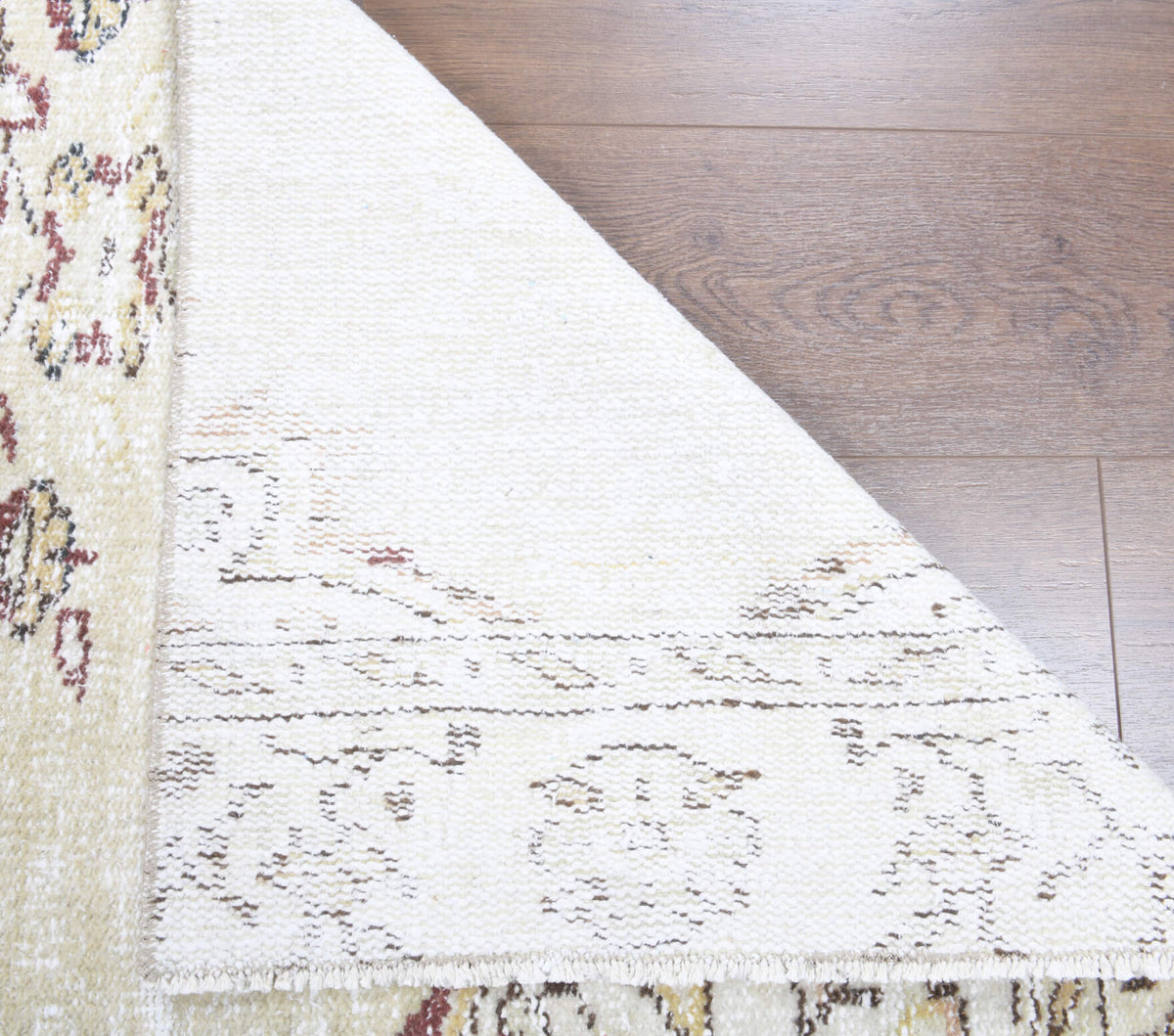 Akikara runner: 1970s handmade Anatolian runner with oriental motifs and cotton backing