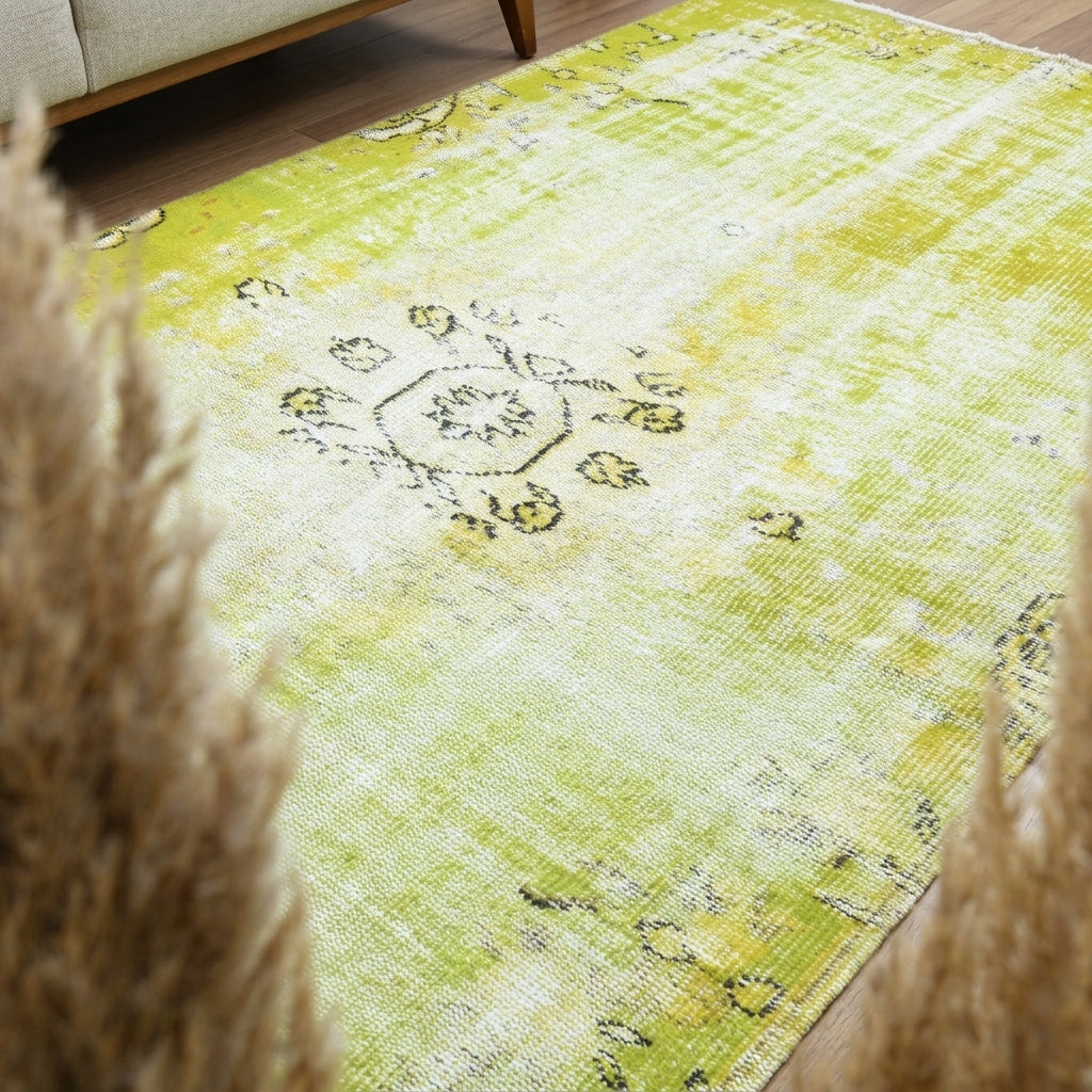 Abstract pattern on the Glaucodike Pistachio distressed vintage area rug – handmade in Anatolia, Turkey