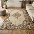 Medallion and bordered pattern on the Mehtapnur vintage area rug – handmade in Anatolia, Turkey
