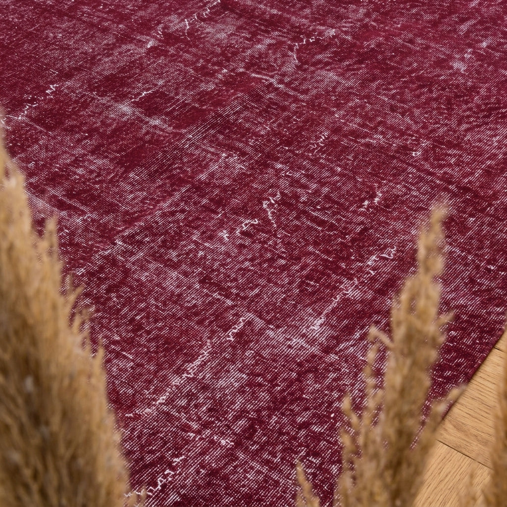 Solid pattern on the Yildizsema Mulberry overdyed vintage area rug – handmade in Anatolia, Turkey