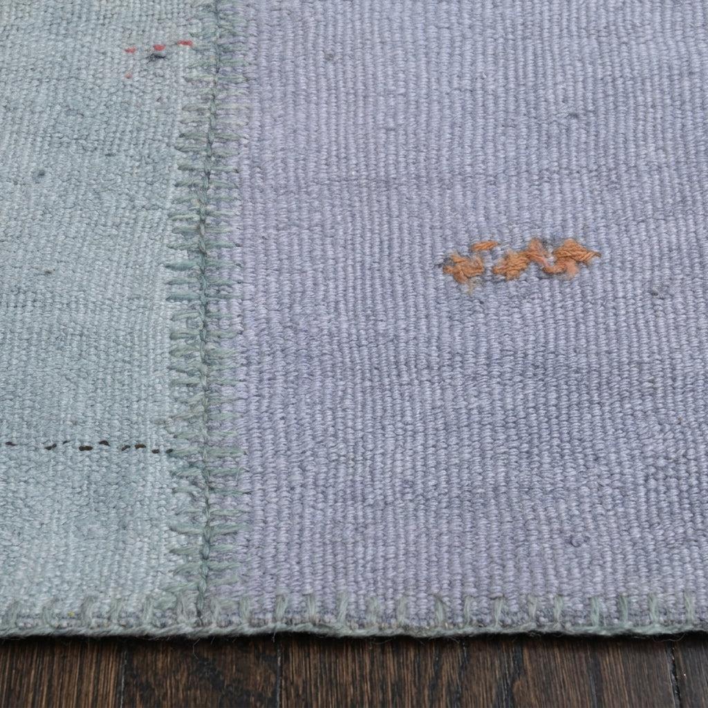Oriental pattern on the Aristophyllis vintage patchwork area rug – handmade in Anatolia, Turkey