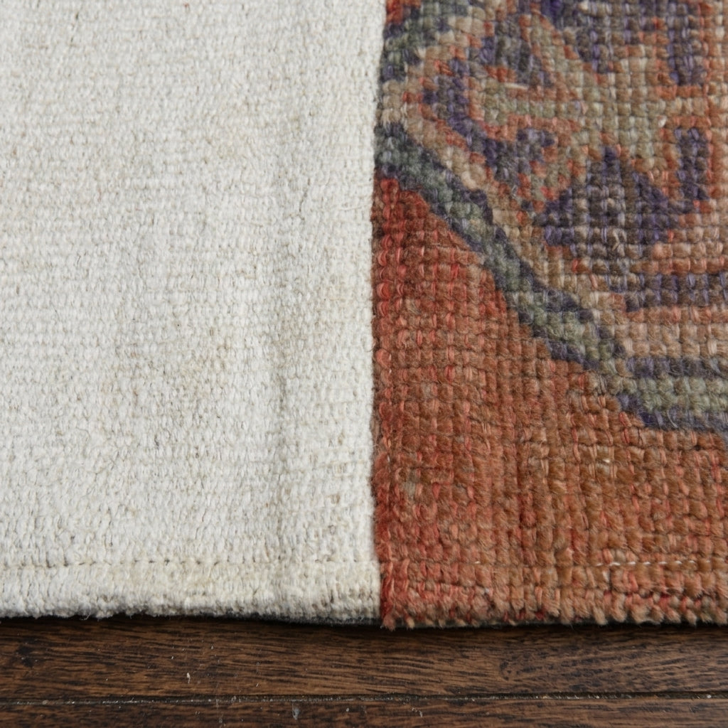 Ikat pattern on the Astrapetra vintage patchwork area rug – handmade in Anatolia, Turkey